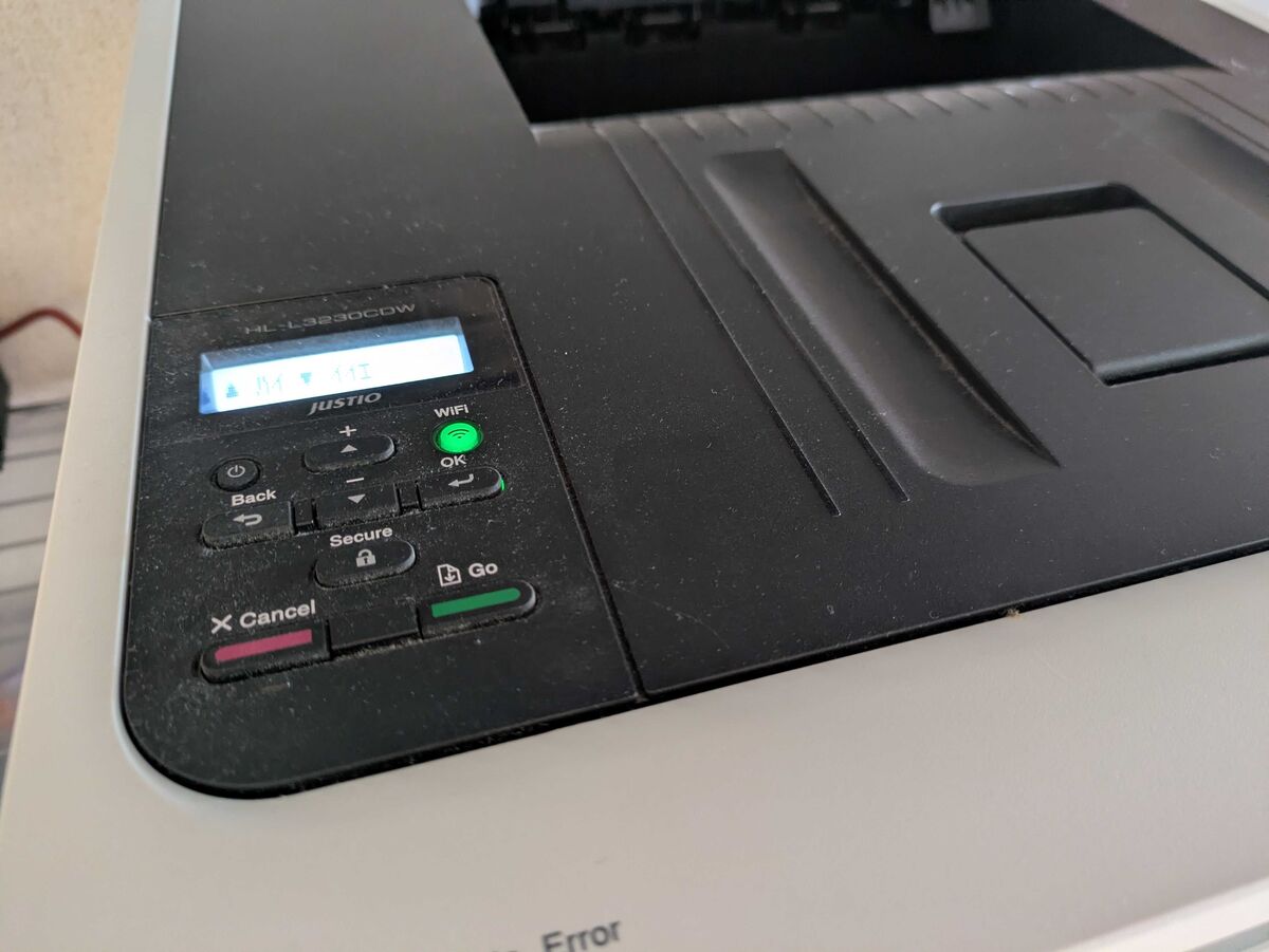 操作パネル JUSTIOの文字とWi-Fiランプ